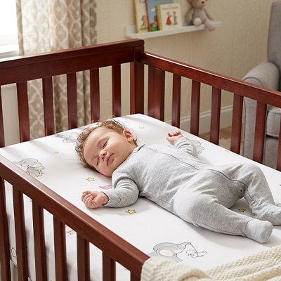 bebe endormi sur draps housse bebe elephant