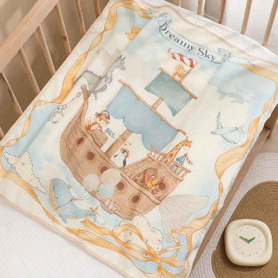 couverture emmaillotage bébé bâteau étendu dans bassinette