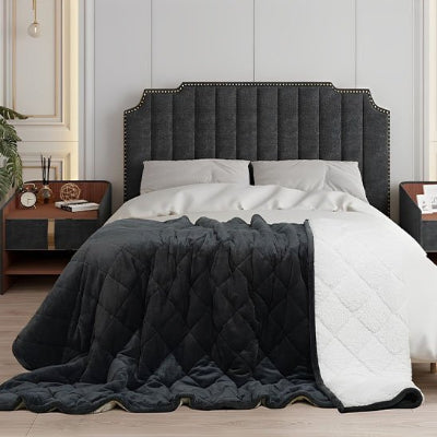 couverture lestée noire utilisée comme édredon