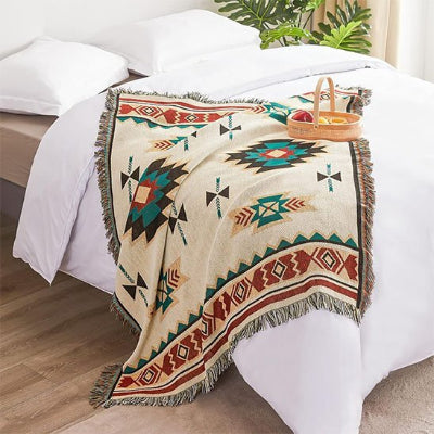 couverture style sud ouest dépose sur lit