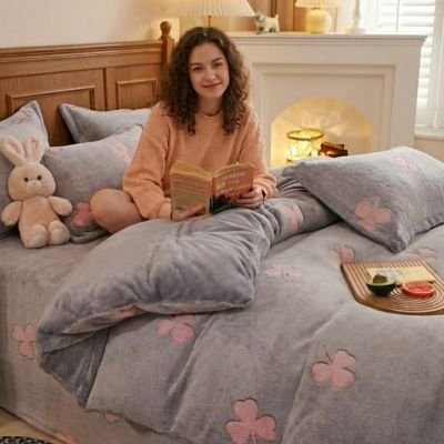 femme lisant avec housse de couette 1 personne