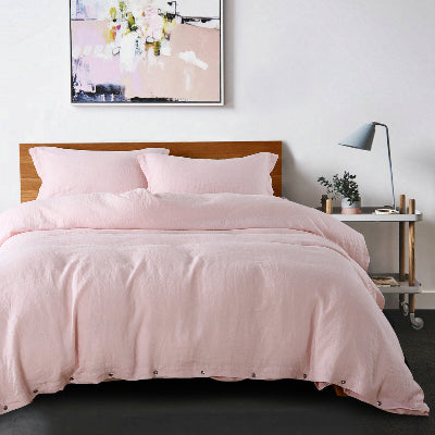 housse de couette lin rose placé sur lit