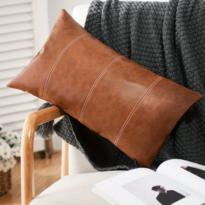 housse de coussin 30x50 simili déposé sur chaise