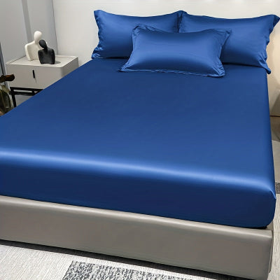 lit avec draps housse bleu