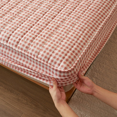 main plaçant coin protège matelas 140x190 vichy rose