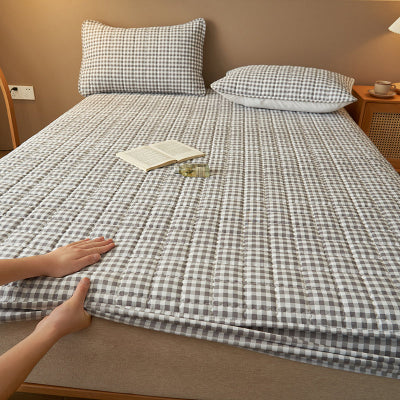 main plaçant protège matelas 140x190 vichy gris