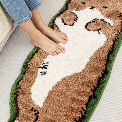 pieds enfant sur tapis enfant chat orange