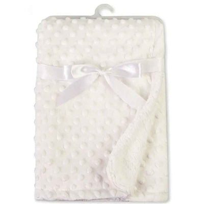 plaid bébé blanc plier et orner dun ruban