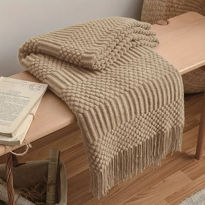 plaid kaki plié sur banc