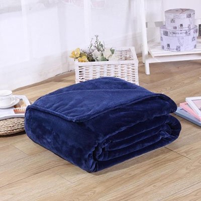 présentation couverture bleue plier et déposer sur table