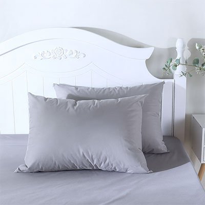 taie doreiller grise placé lune devant lautre