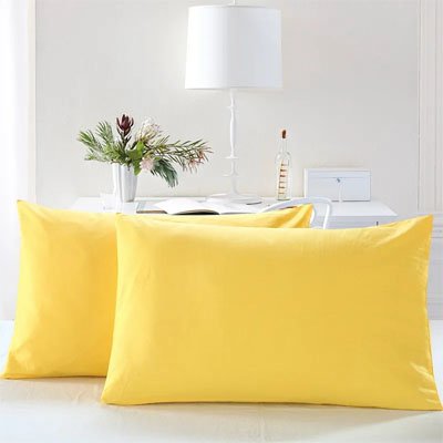 taie doreiller placer lune devant lautre sur matelas