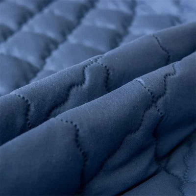 vue de près tissu matelasse protege oreiller