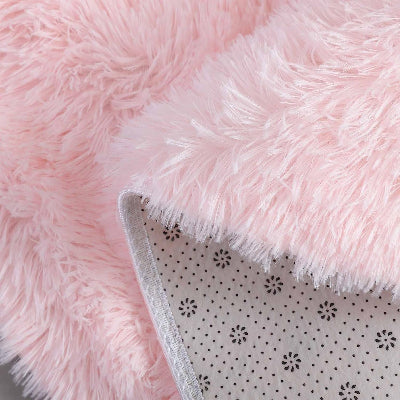 vue deux côtés tapis rond rose