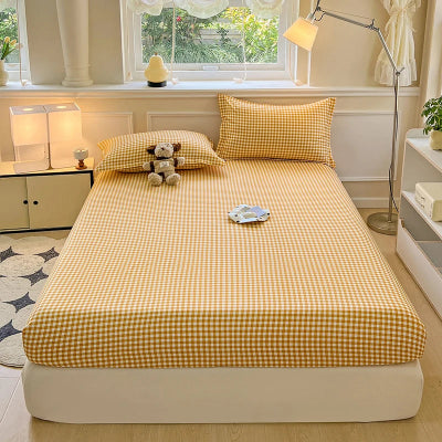 vue lit avec draps housse jaune