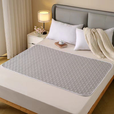 vue protection pour matelas gris sur lit