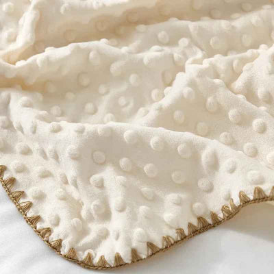 zoom côté velour a bulle couverture bebe