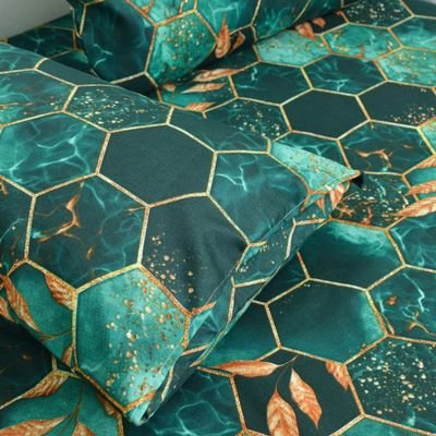 zoom sur motif géométrique taie doreiller verte