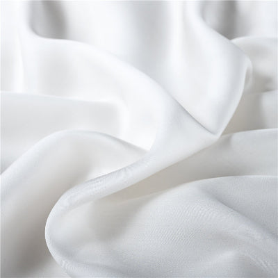 zoom tissu taie d'oreiller en soie blanche